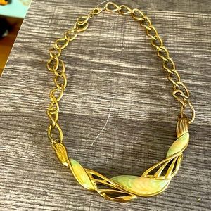 Vintage gold tone with muted enamel leaves Trifari necklace .